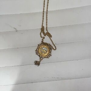 a capricorn necklace.